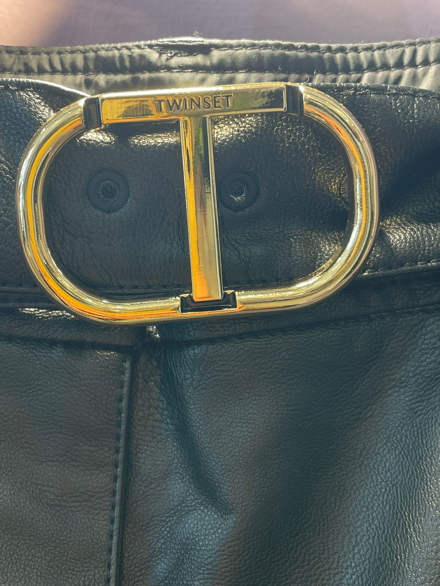 Pantalone in pelle con cinta removibule