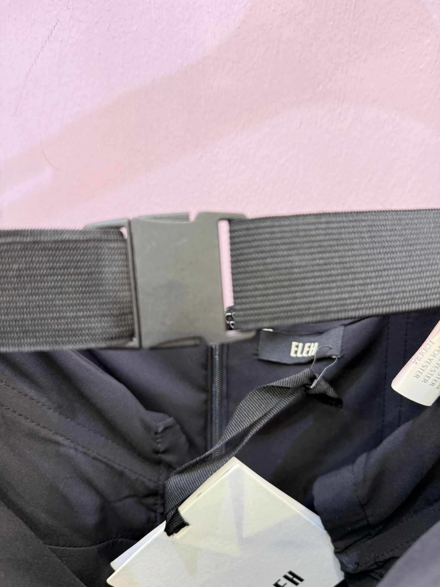 Top ELEH nero con fascia sul decolté